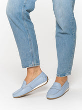 Load image into Gallery viewer, Light blue loafers worn with light blue jeans on a white background
