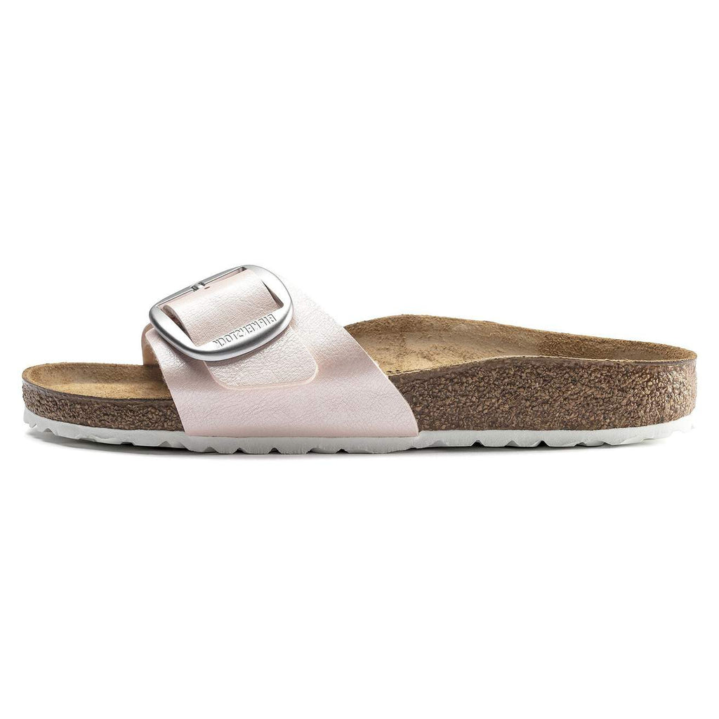 Birkenstock sandal with a metallic strap on a white background