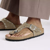 Brown sandal with cork sole on a white background