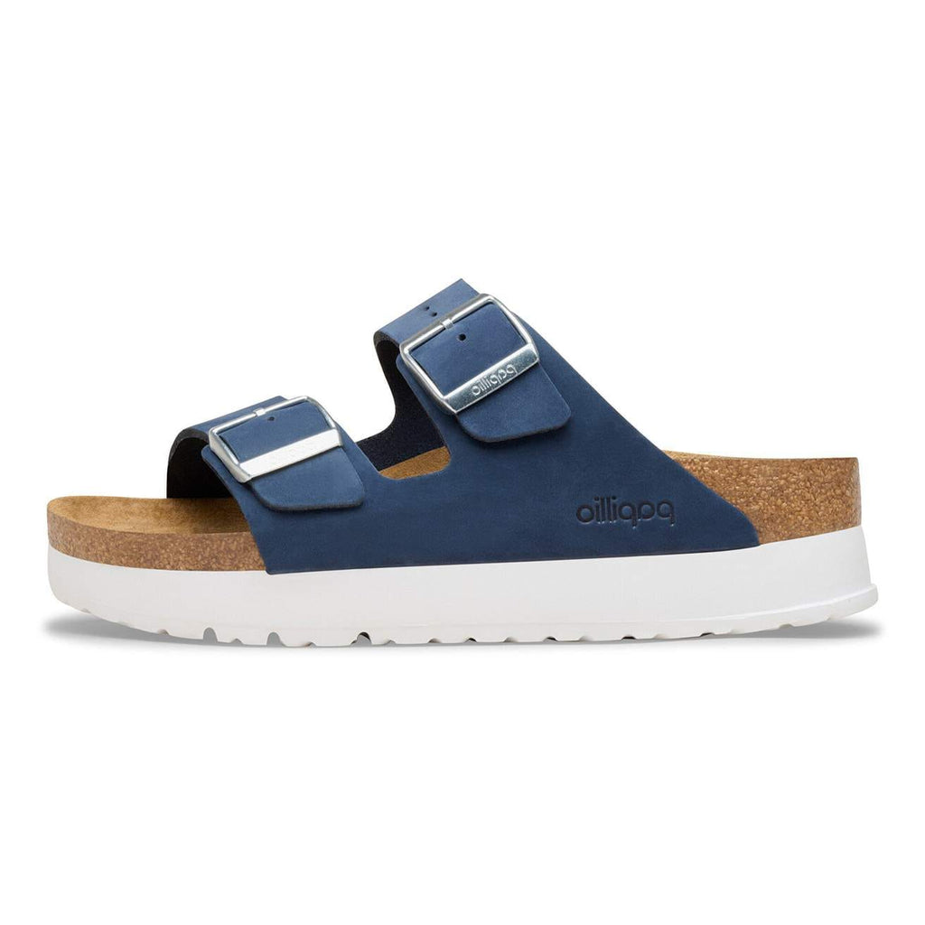 Blue sandal with cork sole on a white background