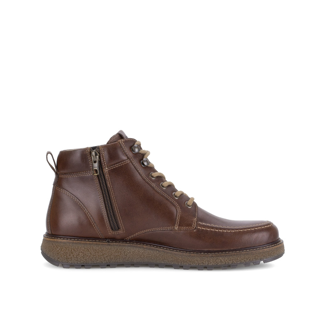 Brown leather boot with a zipper on a white background
