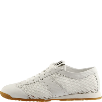 White sneaker with a textured pattern on a white background
