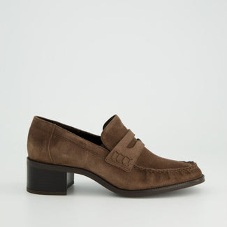 Brown suede loafer shoe on a light gray background