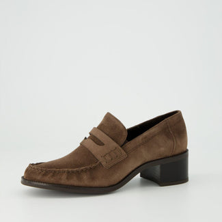 Brown suede loafer shoe on a light gray background