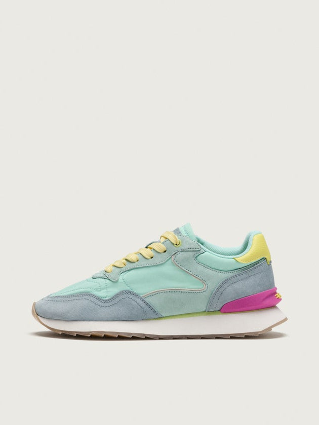 Multicolored sneaker on a light gray background