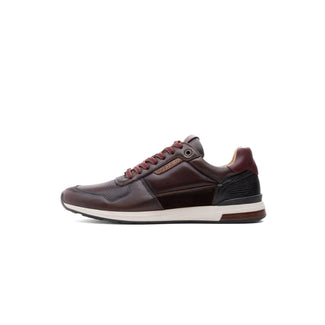 A dark brown leather sneaker with matching brown laces, a black textured heel panel, and a white midsole, shown in a side profile on a white background.