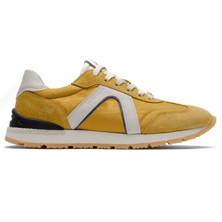 Yellow sneaker with white accents on a white background