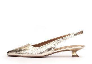 Gold slingback shoe on a white background