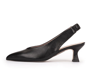 Black slingback pump on a white background