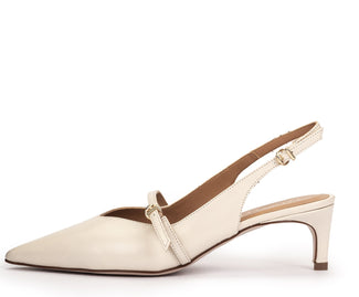 Beige slingback shoe on a white background