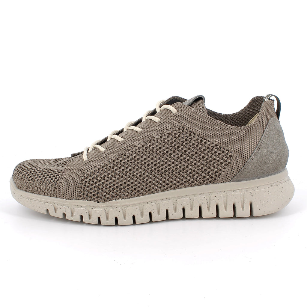 Gray sneaker with a white sole on a white background