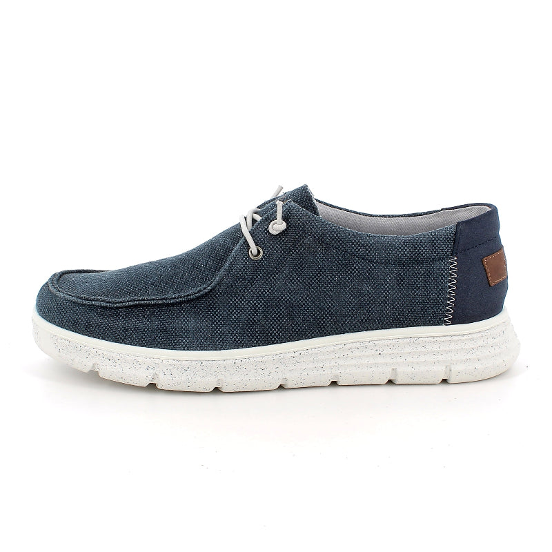 Blue casual shoe with white sole on a white background
