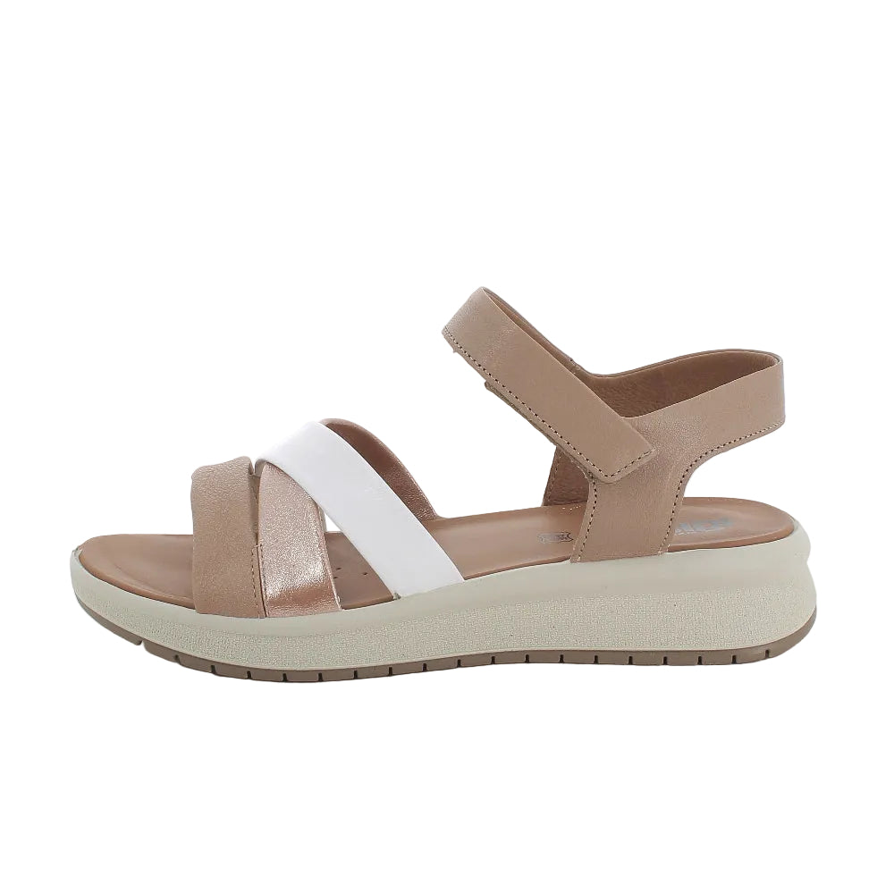 Beige sandal with white straps on a white background