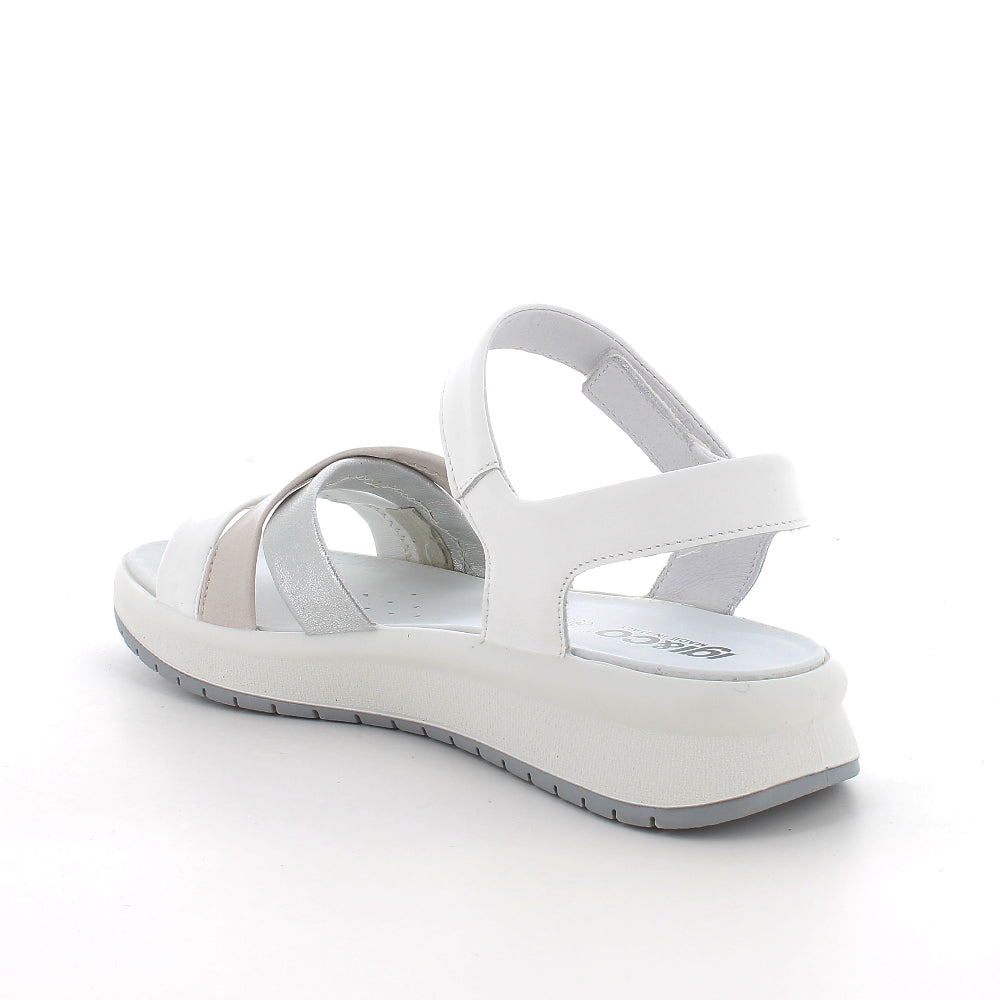 White sandal with a platform sole on a white background