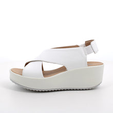 Load image into Gallery viewer, White sandal with a platform sole on a white background
