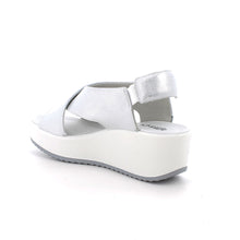 Load image into Gallery viewer, White sandal with a platform sole on a white background
