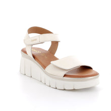 Load image into Gallery viewer, White sandal with brown sole on a white background
