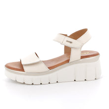 Load image into Gallery viewer, White sandal with brown sole on a white background
