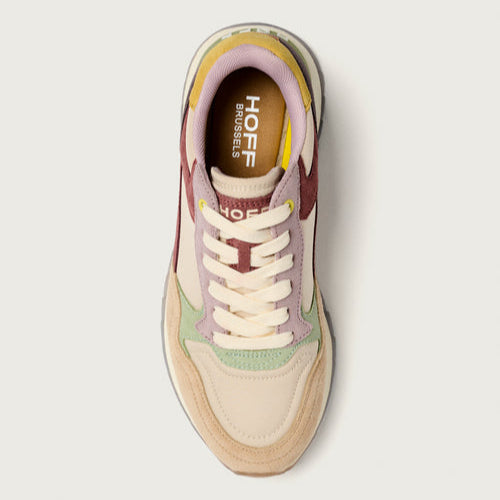 Sneaker with visible brand logo on a light background