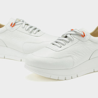 White sneaker on a light gray background