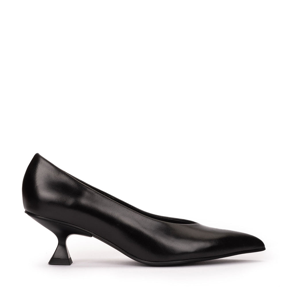 A single black leather pump with a pointed toe and a sculptural low kitten heel, shown in profile against a plain white background.