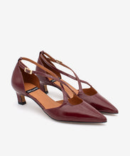 Load image into Gallery viewer, Pair of maroon high heels with thin straps on a white background
