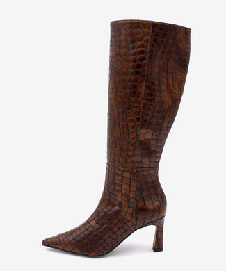 Brown knee-high boot with crocodile pattern on a white background
