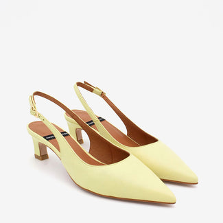 Yellow slingback shoe on a white background