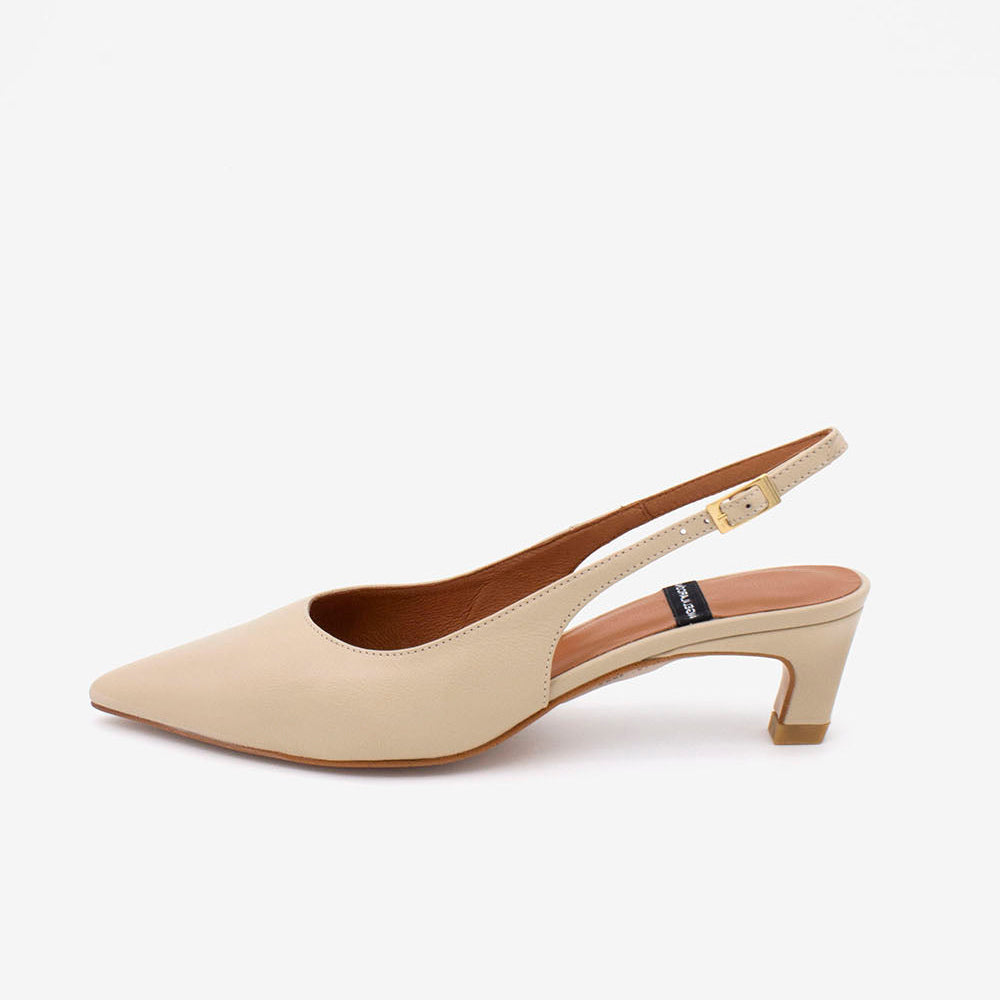 Beige slingback shoe on a white background