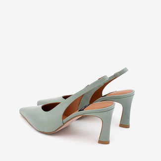 Pair of light green high-heeled shoes on a white background