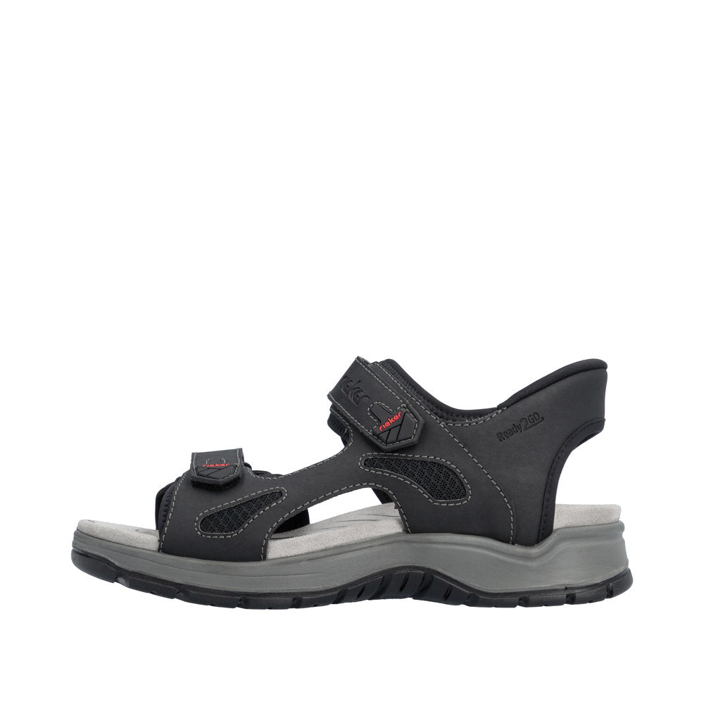 Black sandal with gray sole on a white background
