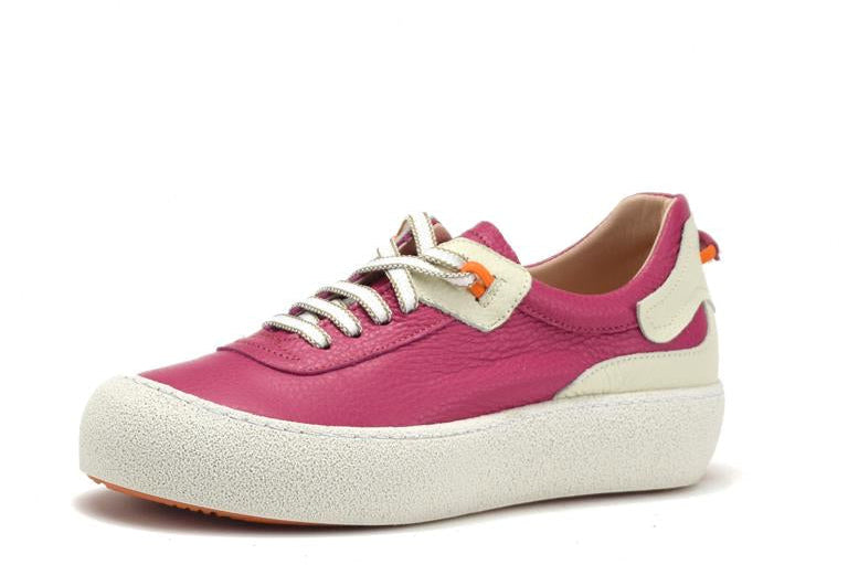 Pink sneaker with white sole on a white background