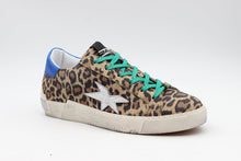 Load image into Gallery viewer, Leopard print sneaker with green laces on a white background
