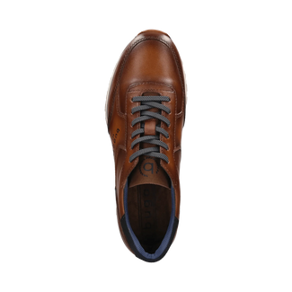A brown leather Bugatti sneaker with dark navy laces, a navy heel tab, and a beige midsole, shown from a side profile on a white background.