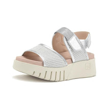 Load image into Gallery viewer, Silver sandal with pink sole on a white background

