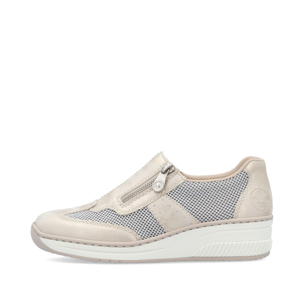 Beige sneaker with mesh design on a white background