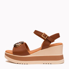 Load image into Gallery viewer, Brown wedge sandal with a beige sole on a white background
