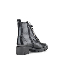 Load image into Gallery viewer, Black leather boot with a zipper on a white background

