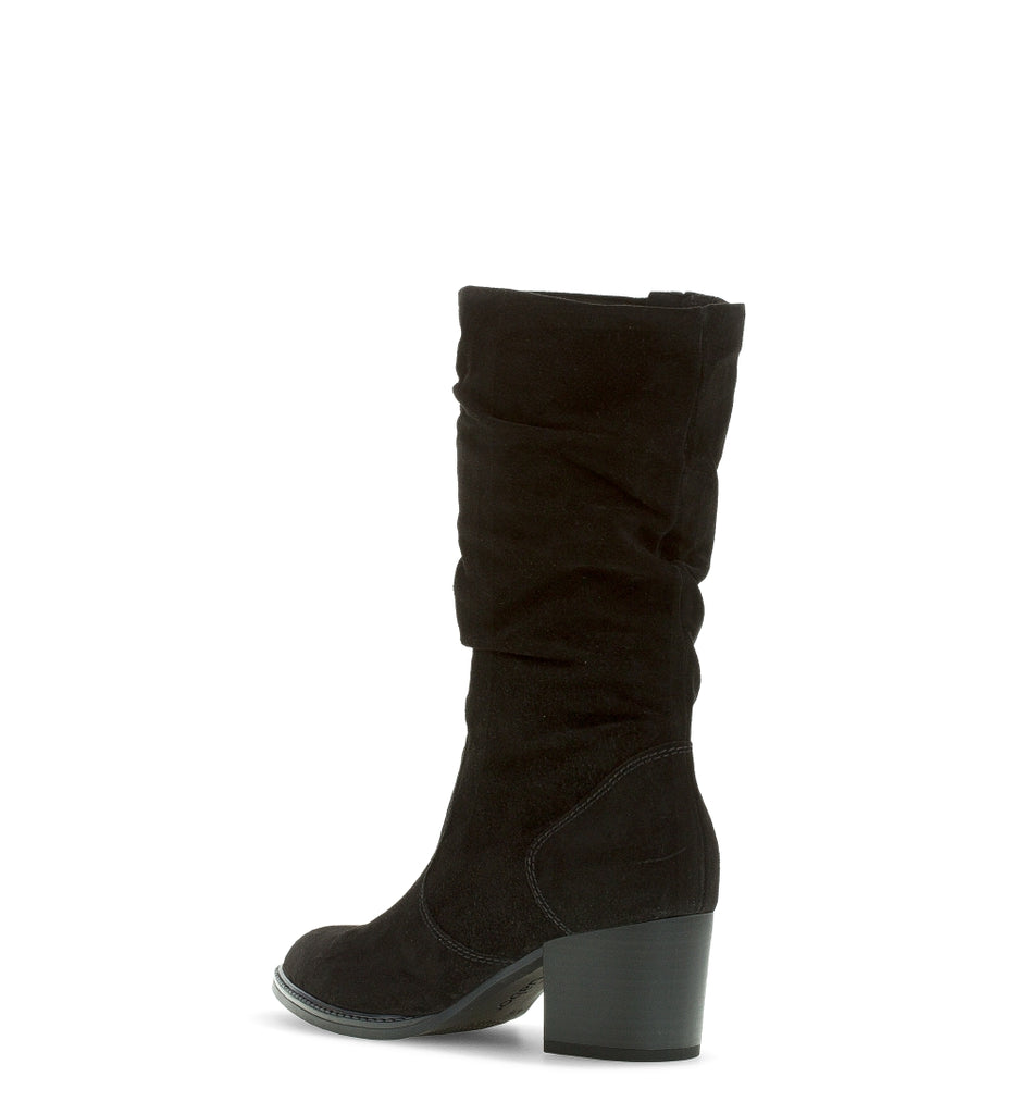 Black knee-high boot on a white background