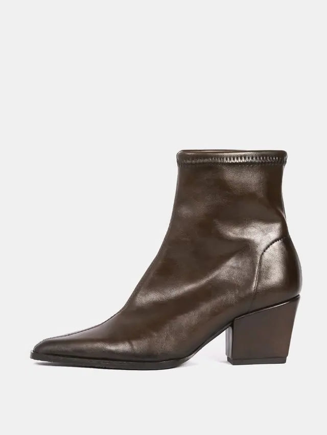 A dark brown leather ankle boot with a pointed toe and a low block heel, shown from a side profile on a light gray background.
