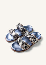 Load image into Gallery viewer, Blue sandals with zebra pattern straps on a white background
