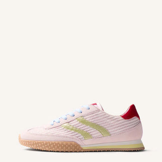 Pink sneaker with red accents on a white background