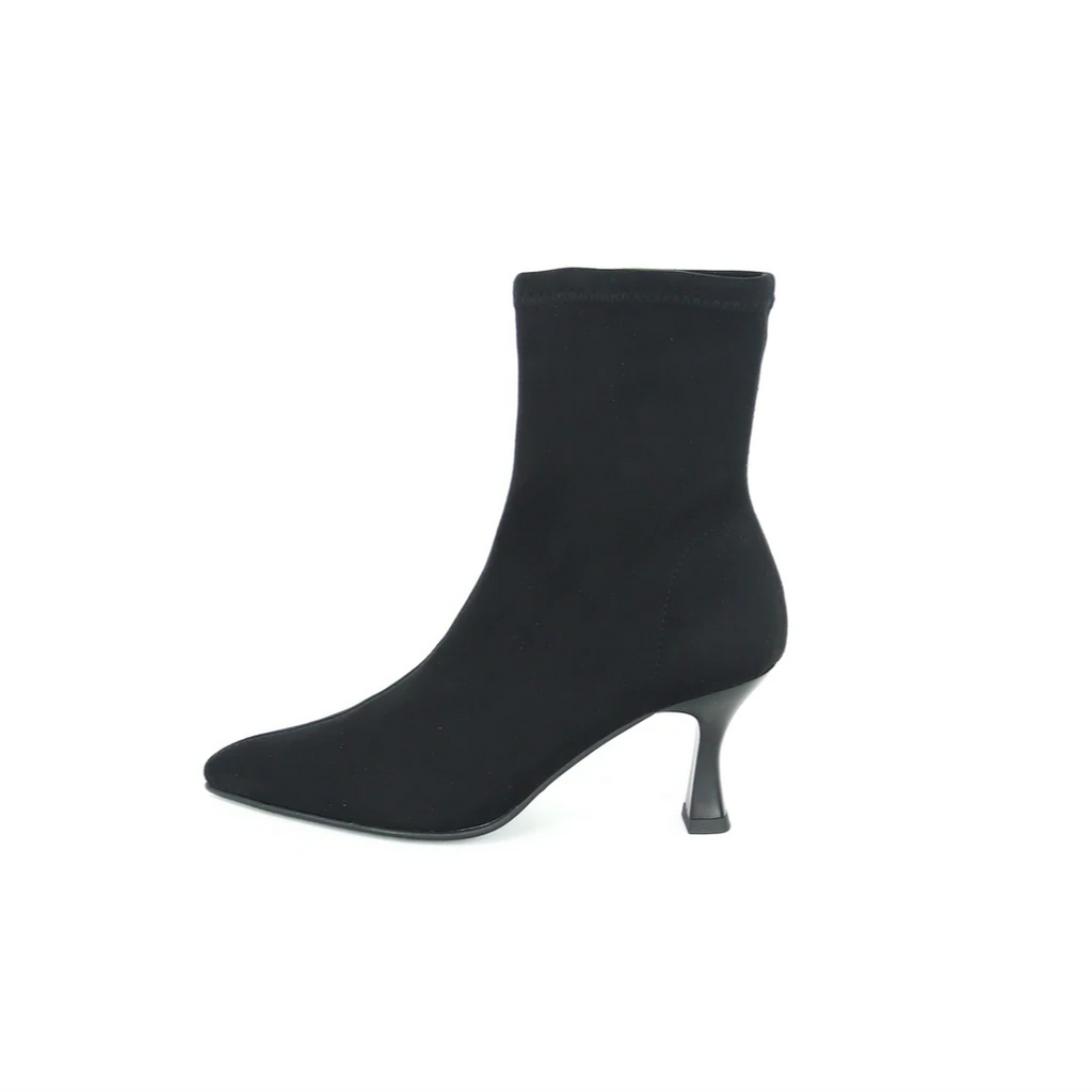 Black sock boot with a thin heel on a white background
