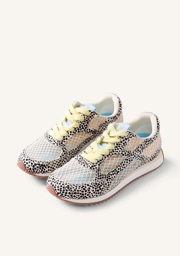 Pair of animal print sneakers with light-colored accents on a white background
