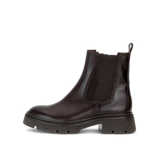 Brown leather Chelsea boot on a white background
