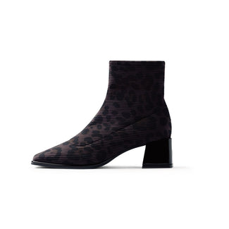 Black lace-up boot on a white background