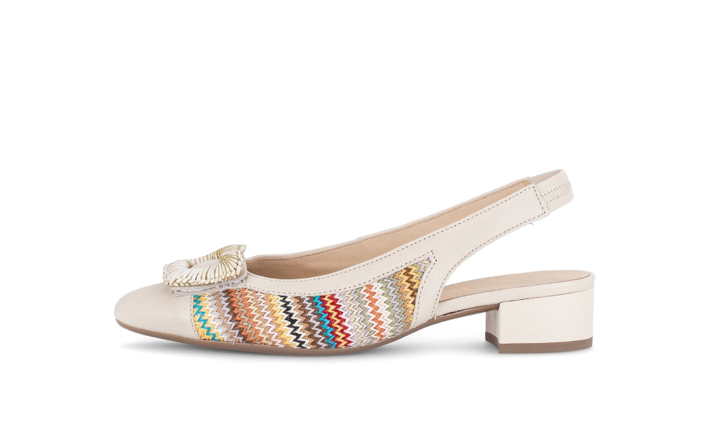 Beige sandal with colorful woven strap on a white background