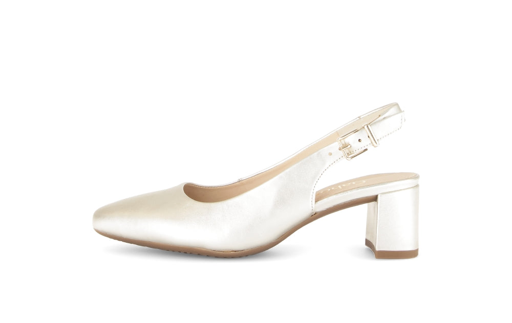 White shoe with a block heel on a white background
