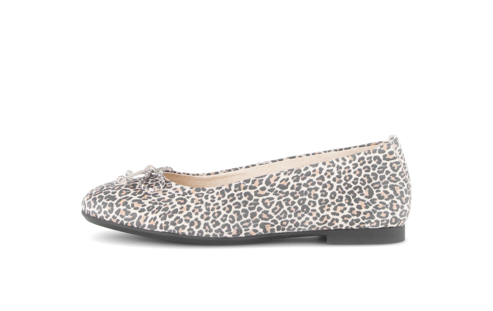 Leopard print flat shoe on a white background
