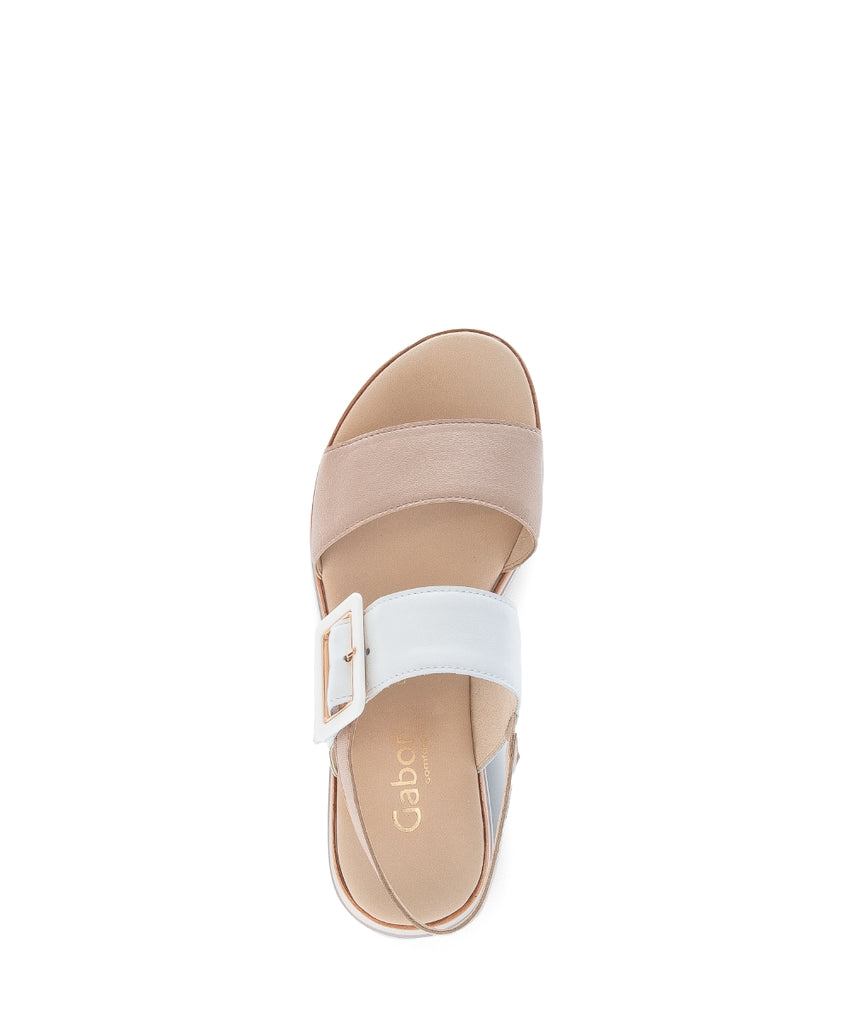 Beige sandal with a white strap on a white background